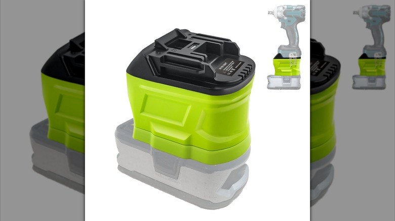 Close-up of a plastic Ryobi-to-Makita battery adapter.