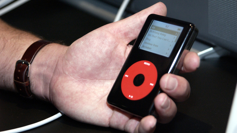 A black and red U2 Special Edition iPod with signatures on the backplate.