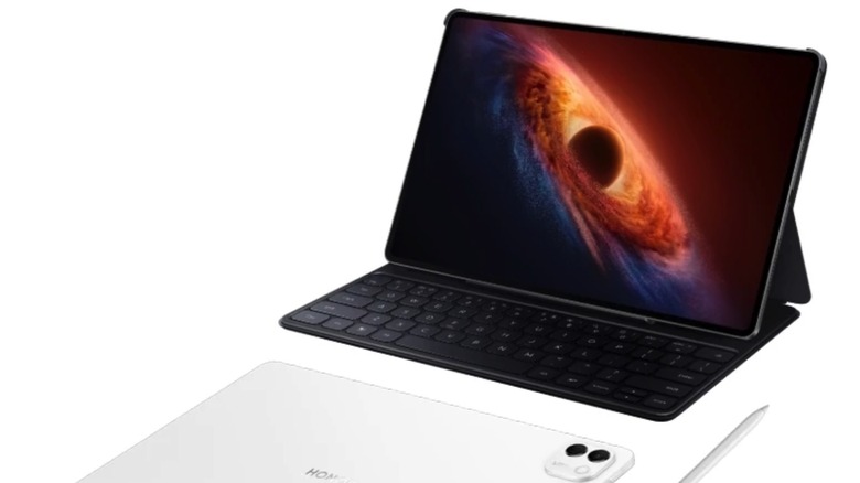 Honor MagicPad 4 connected to its official keyboard dock in a laptop-style configuration.