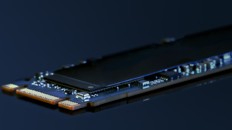 A 2.5-inch SATA SSD shown against a vibrant blue background.