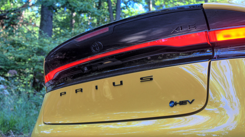 Detail shot of the Toyota Prius rear badge.