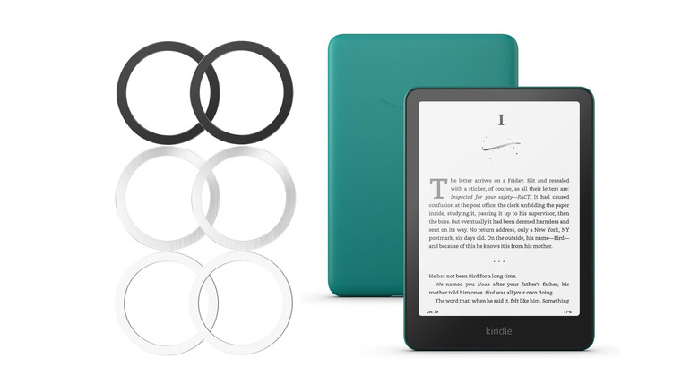 Close-up of the Kalapop metal ring and the back of a Kindle Paperwhite.