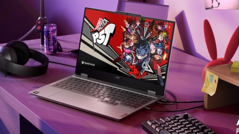 A Lenovo LOQ 15 laptop on a gaming desk playing Persona 5 Tactica, with the Xbox Game Pass logo visible.