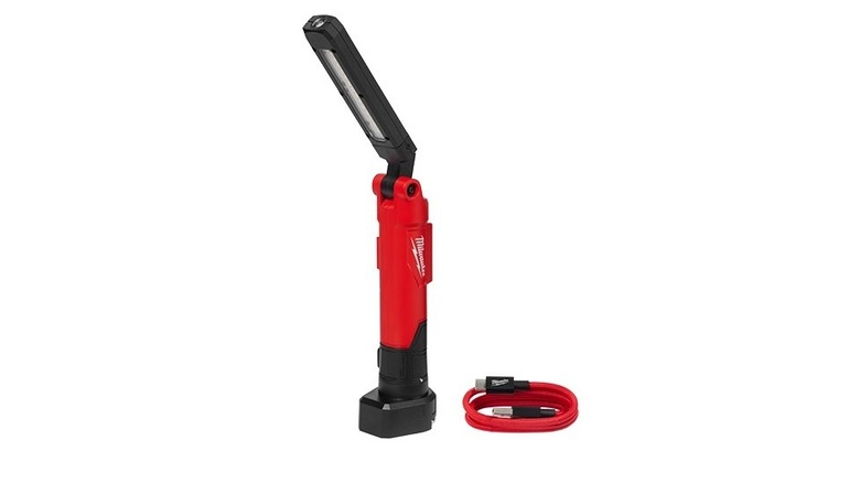 Milwaukee RedLithium USB Stick Light with its charging cord attached.