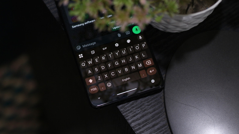 Close-up of the Gboard interface on a modern Android smartphone.