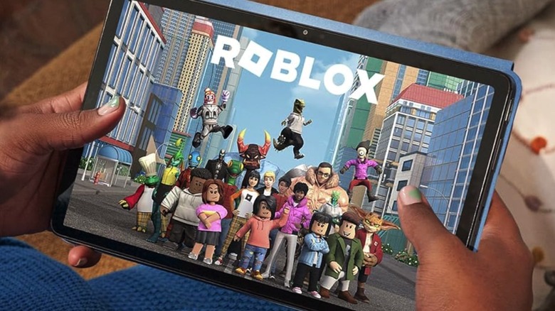 An Amazon Fire Max 11 tablet displaying the game Roblox.