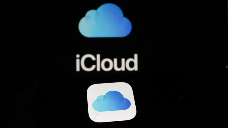 The Apple iCloud logo shown on a smartphone screen.