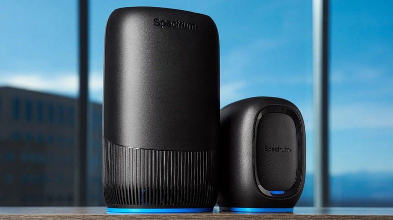 A Spectrum Invincible Wi-Fi 7 router sitting on a desk, representing uninterruptible connectivity for remote work.
