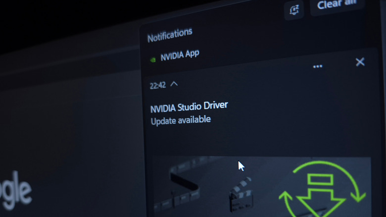 A computer screen displaying the Nvidia software interface with a driver update notification.