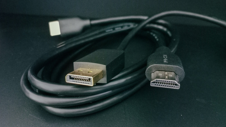 Side-by-side comparison of a DisplayPort connector and an HDMI connector.