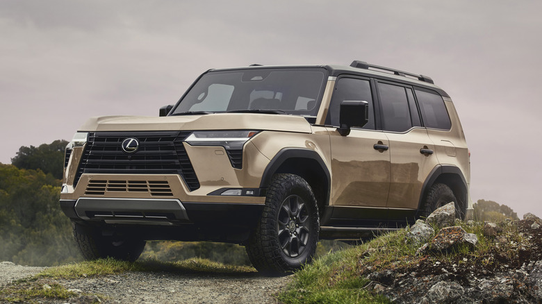 A 2026 Lexus GX 550 Overtrail showcasing its high ground clearance and boxy design.