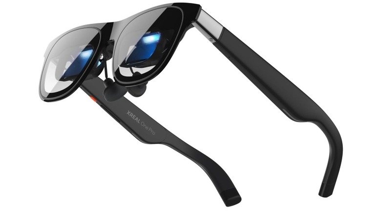 Black Xreal One Pro AR glasses with sophisticated lens modules.