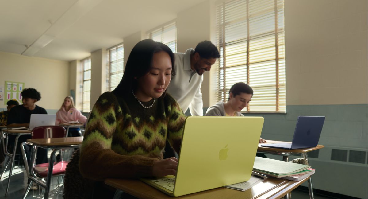 A close-up high-angle shot of the MacBook Neo highlighting its compact 13-inch form factor.
