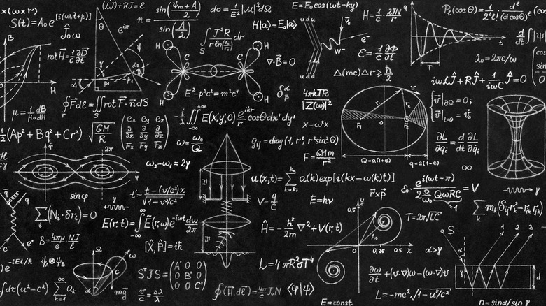 A blackboard covered in complex mathematical equations and formulas.