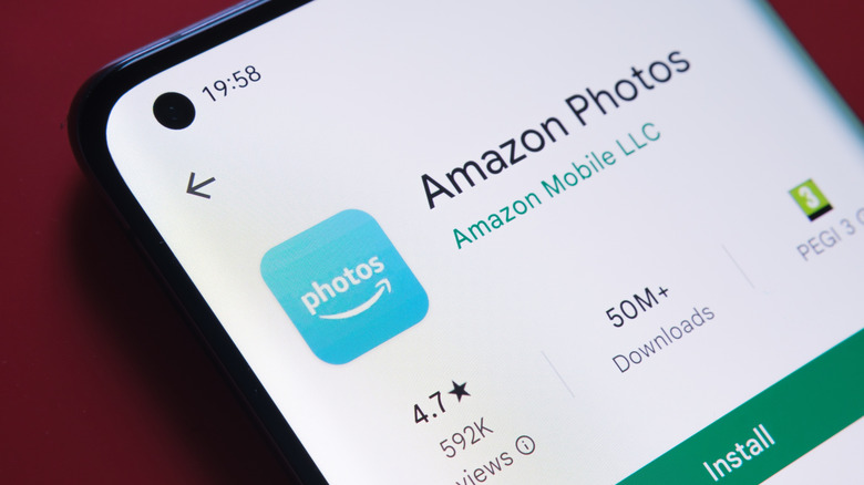 Amazon Photos app listing visible on a smartphone in the Google Play Store.