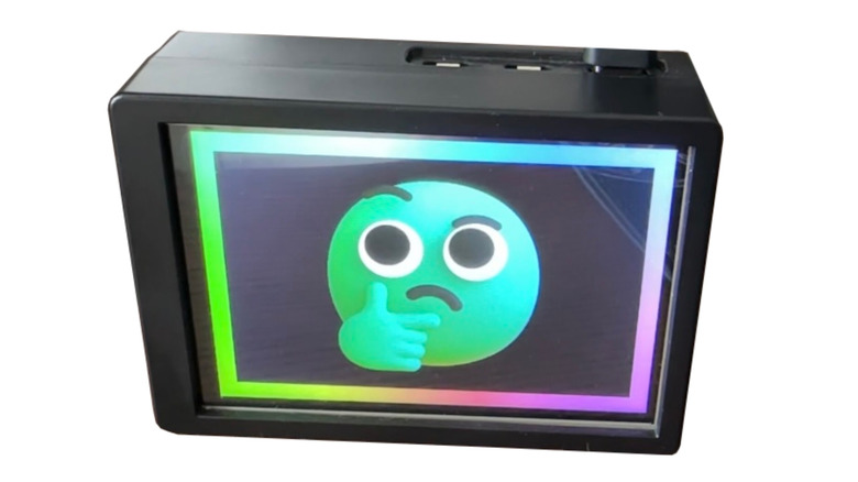A retro-styled Max Headbox digital desktoy used as a physical shell for a Raspberry Pi LLM.