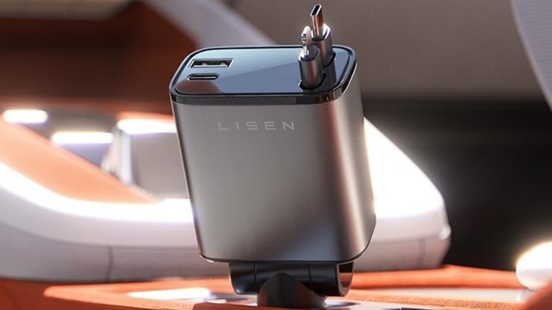 The Lisen retractable car charger installed and ready for use in a car's center console.