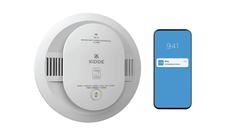 A Kidde Smart Smoke and Carbon Monoxide Alarm featuring a mobile alert notification.