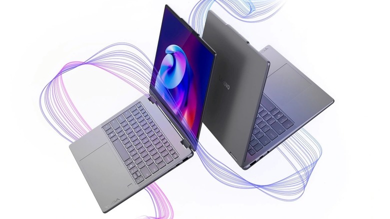 The 14-inch Lenovo Yoga 7i 2-in-1 laptop with artistic wave graphics in the background.