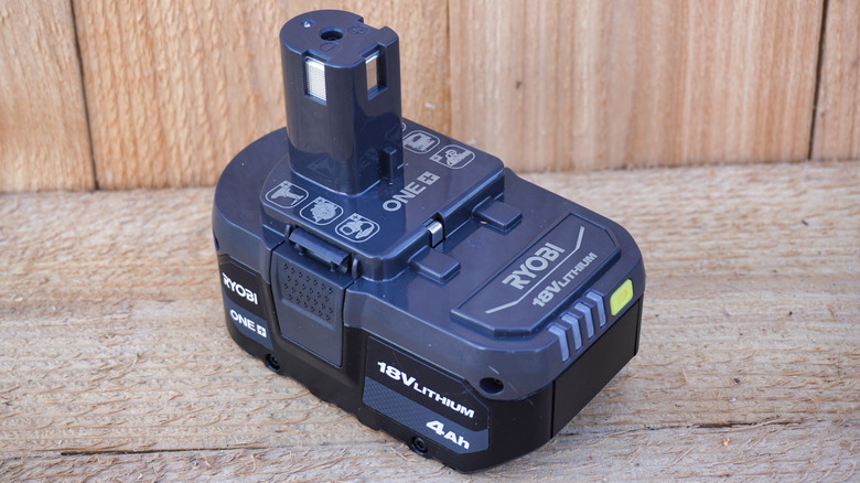 A Ryobi 18V high performance battery pack with its vertical stem connector visible.
