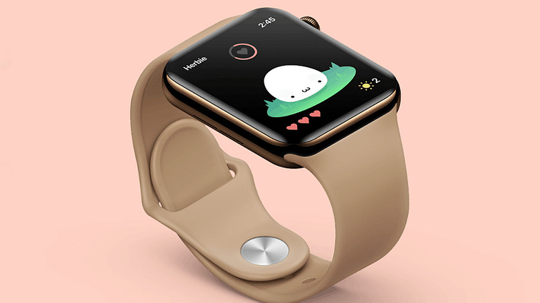 An Apple Watch displaying the Nomi digital pet interface.