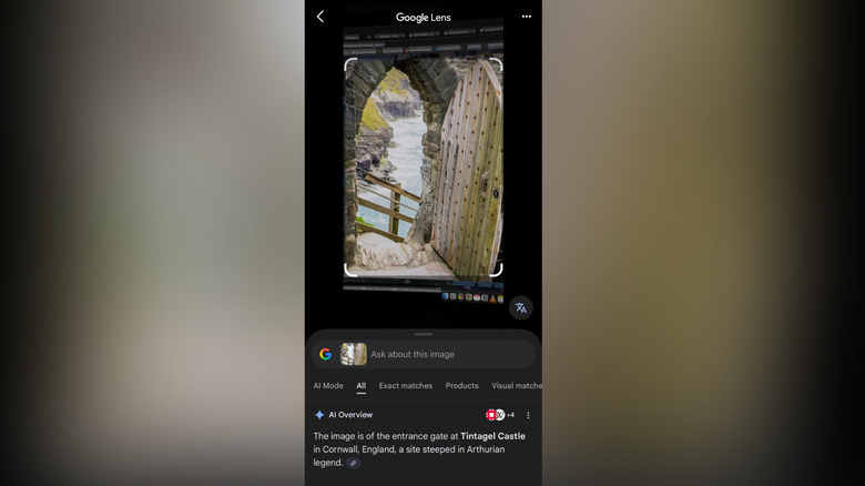 Smartphone interface identifying a specific coastal landmark in Cornwall via Google Lens.