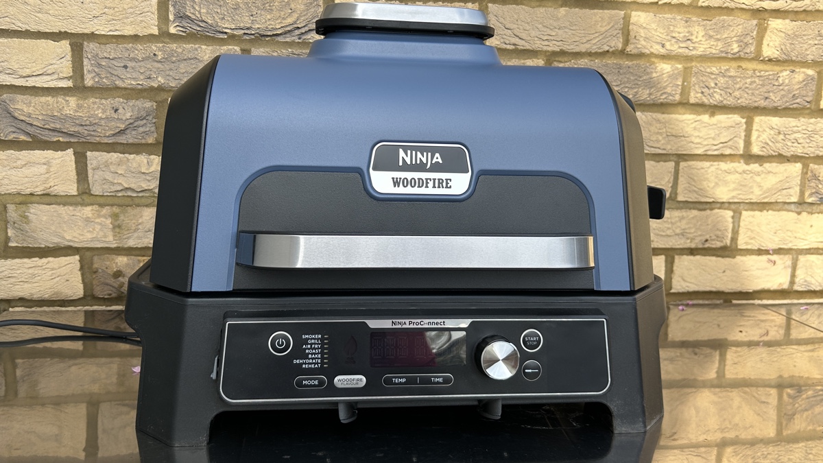 The Ninja Woodfire XL and original grill shown together to illustrate size differences.