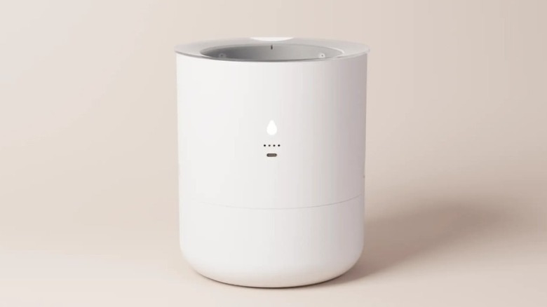 White LeafyPod smart planter with a modern cylindrical design.